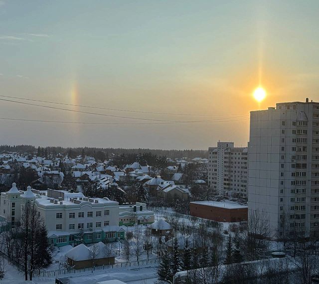 Морозное солнце над городом