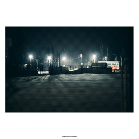 Старое поле, старые заборы и огни нового каткаНо