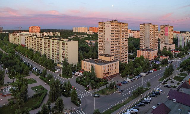 город